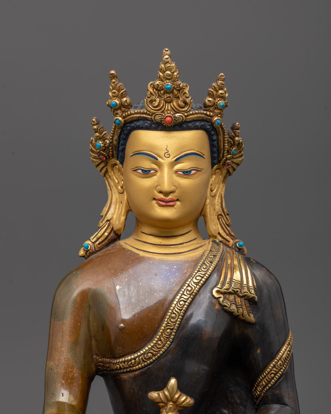 Close-Up of Medicine Buddha Holding a Healing Bowl, Showcasing Fine Carving