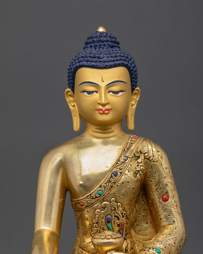 Close-Up of Serene Gold-Gilded Face of Shakyamuni Gotama Buddha Sculpture