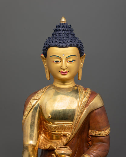 Close-Up of Shakyamuni Buddha Face with 24K Gold Gilding and Serene Expression