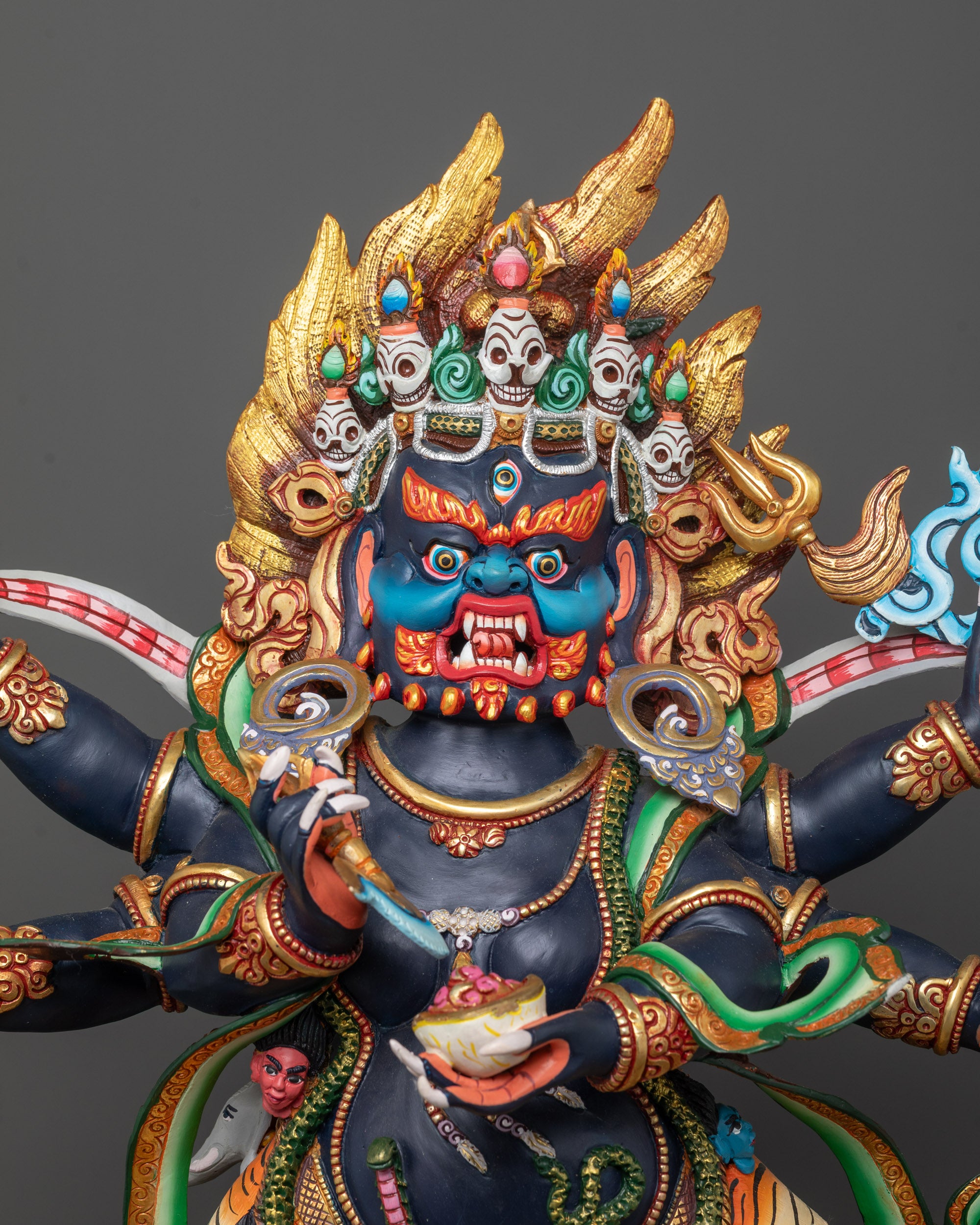 Close-Up of Six Armed Mahakala Holding Symbolic Objects