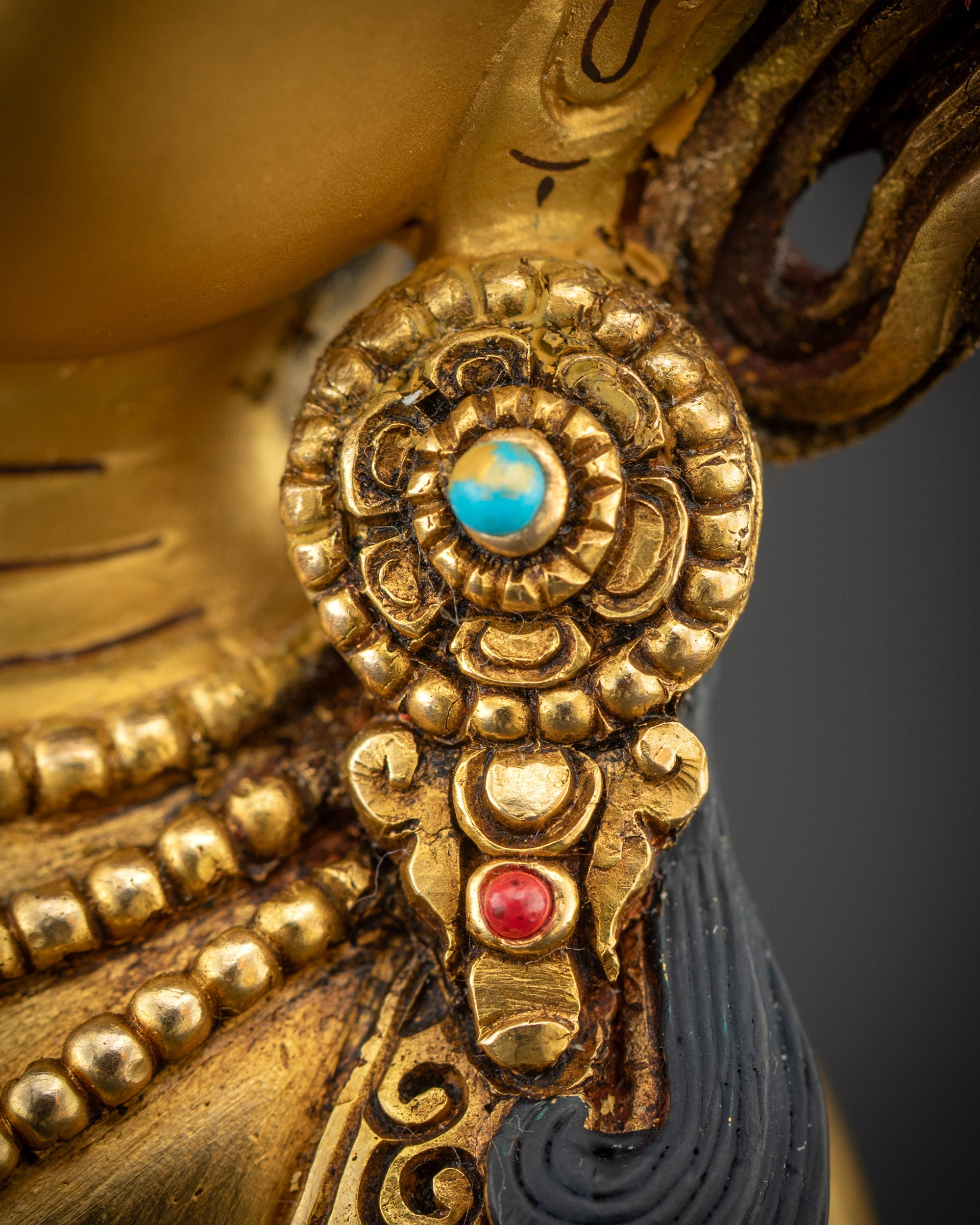 Close-Up of Vajrasattva Earrings | Handcrafted Dorje Sempa Statue with Gold-Gilded Finish