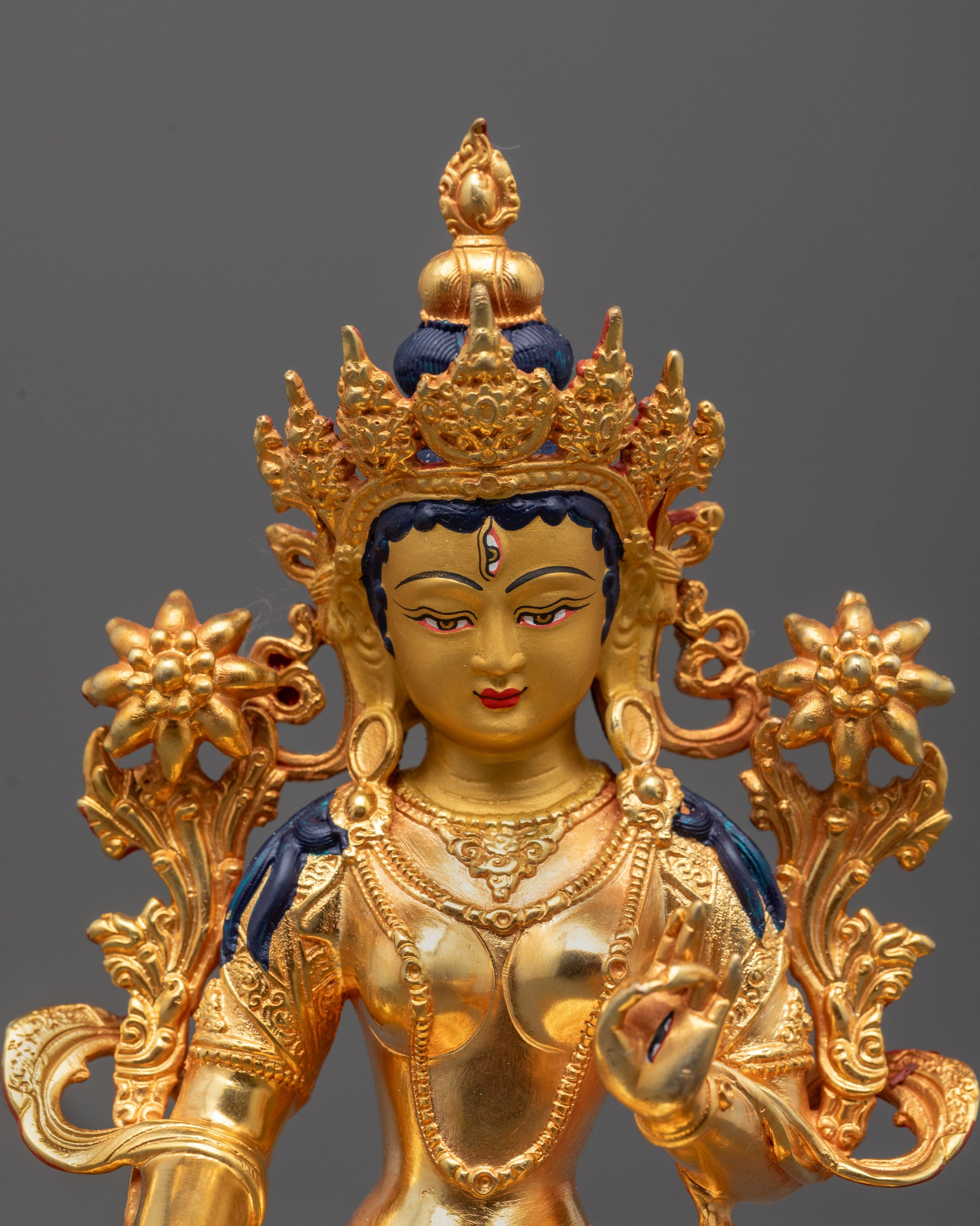 Close-Up of White Tara Face | Serene expression of White Tara with three visible eyes