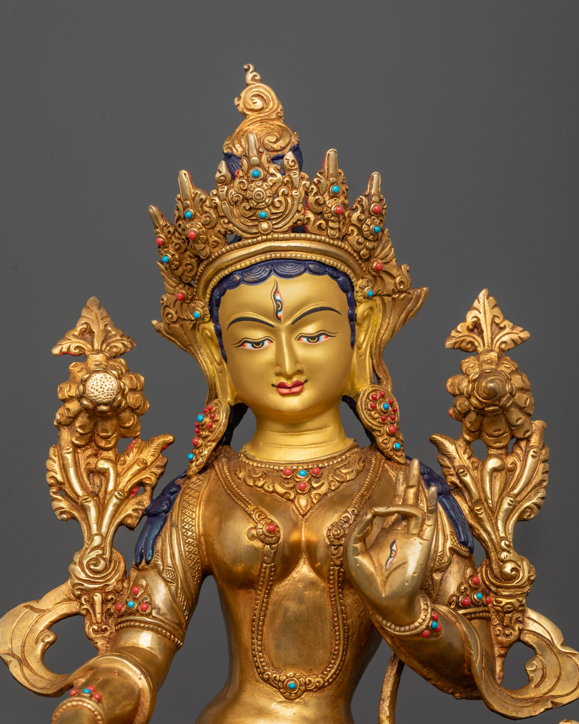 Close-Up of White Tara’s Serene Face and Gold-Gilded Crown