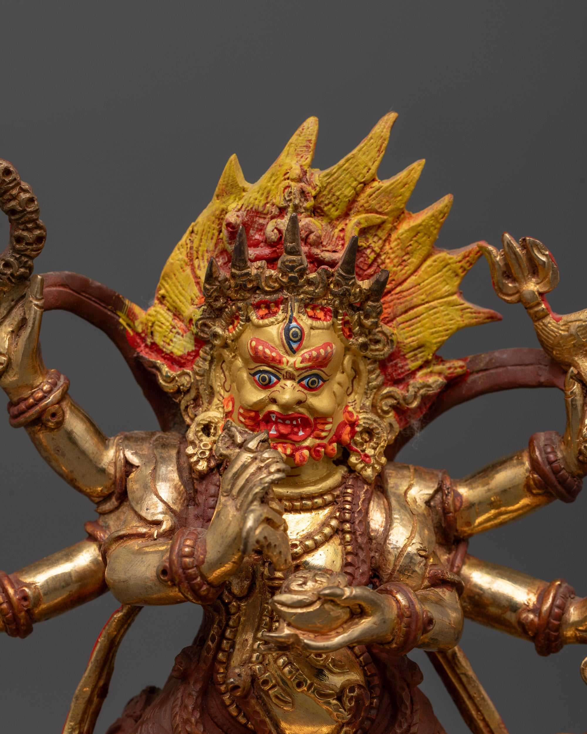 Close-Up of Wrathful Expression and Symbolic Ritual Objects of Six-Armed Mahakala