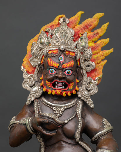 Close up Black Dzambhala oxidized copper statue silver ornaments carved halo Tibetan craftsmanship