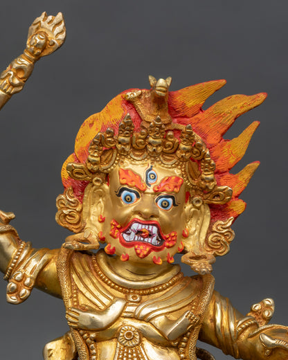 Close up Hayagriva face intense expression gold painted details subduing human figures sacred
