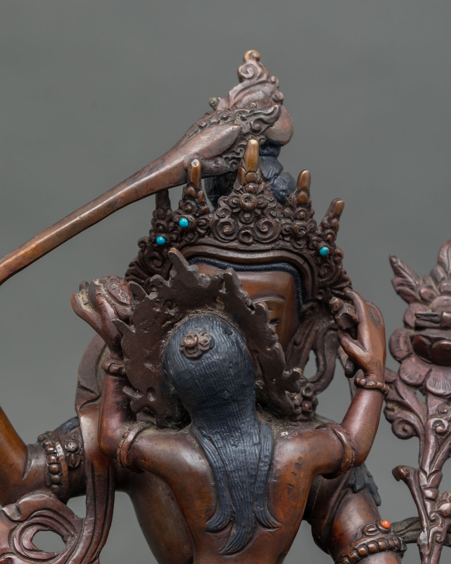 Close up Manjushri face serene expression semi precious stones handcrafted Nepal