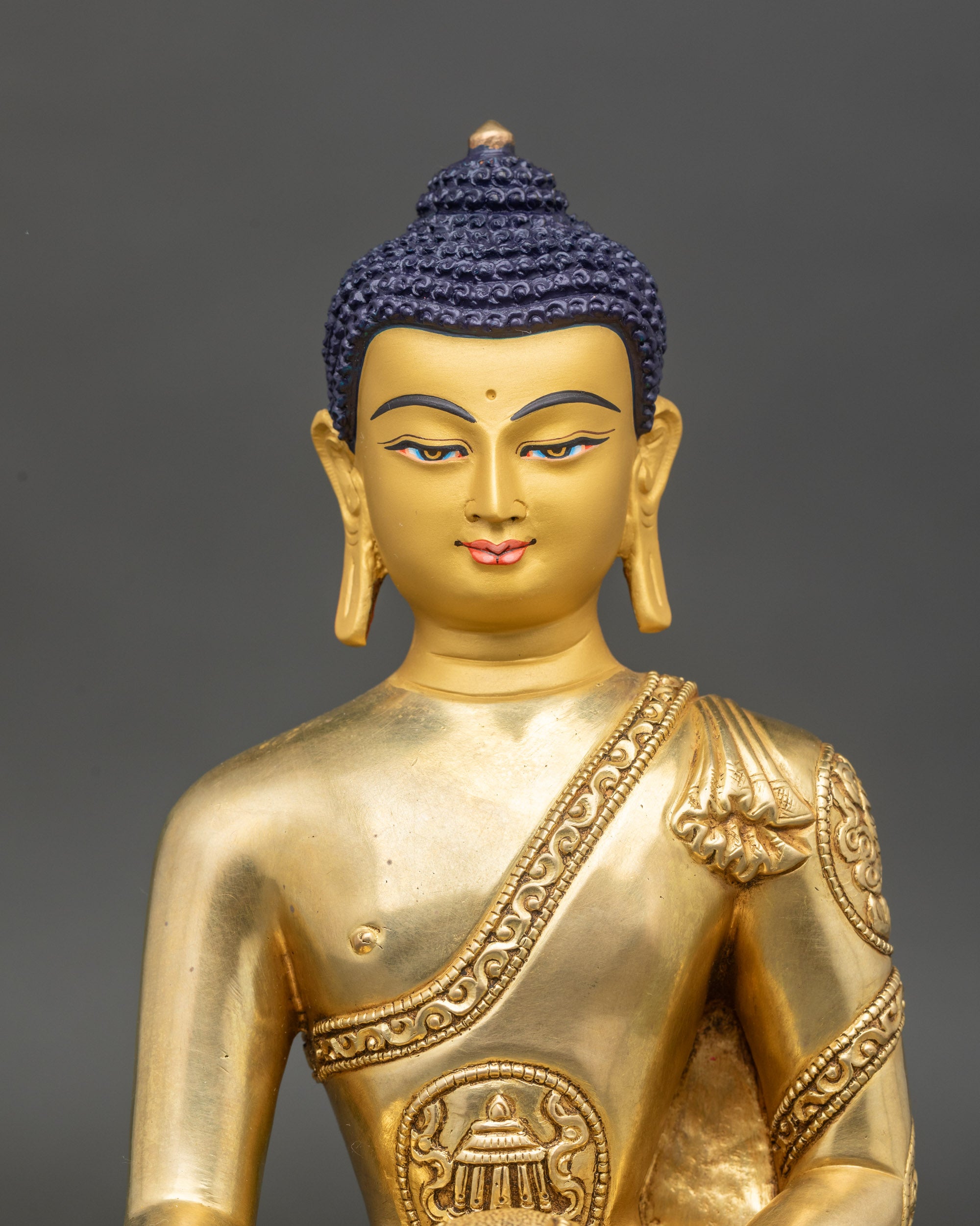 Close-up-Shakyamuni-Buddha-face-serene-expression-earth-touching-mudra