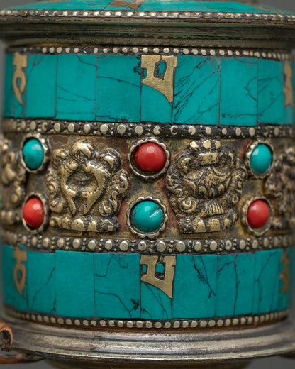 Close up Tibetan Prayer Wheel semi precious stones turquoise coral meditation blessings