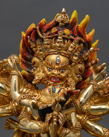 Close up View of Vajrakilaya face gold-painted intricate details Nepalese Buddhist tantric deity