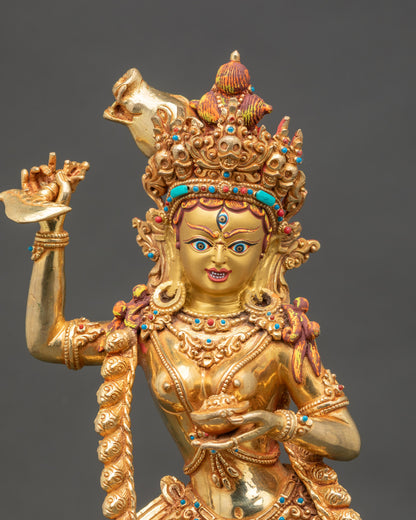 Close-up-face-Dorje-Phagmo-Vajravarahi-gold-plated-face-semi-precious-stones-Himalayan-Buddhist-art