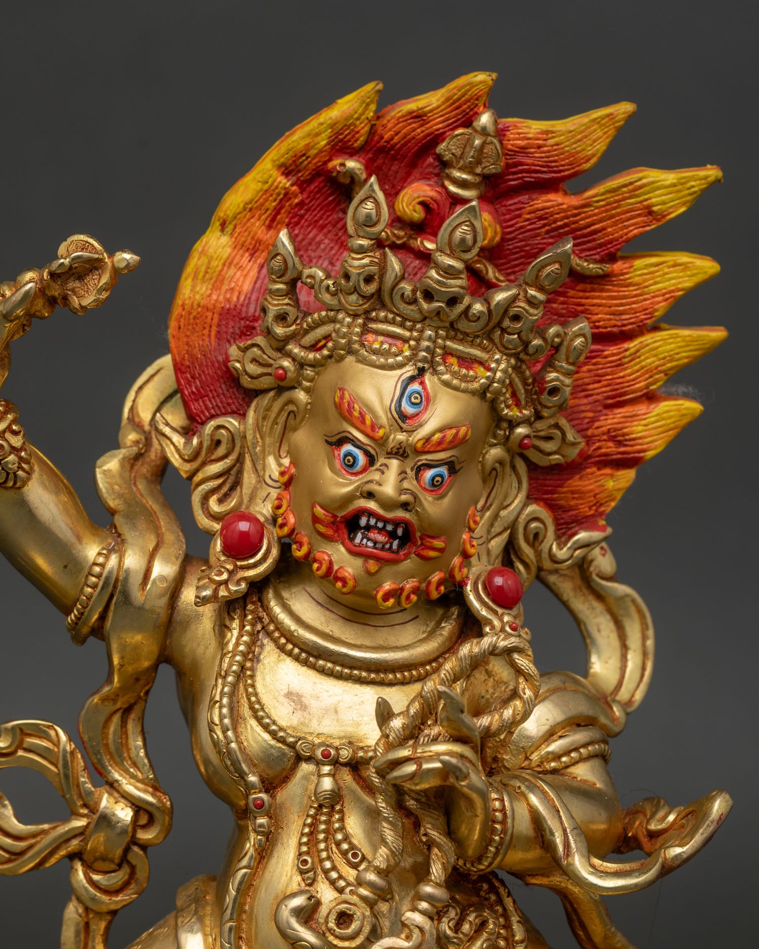 Close-up-of-Vajrapani-Statue-fierce-expression-holding-vajra-detailed-Newari-craftsmanship-Nepal