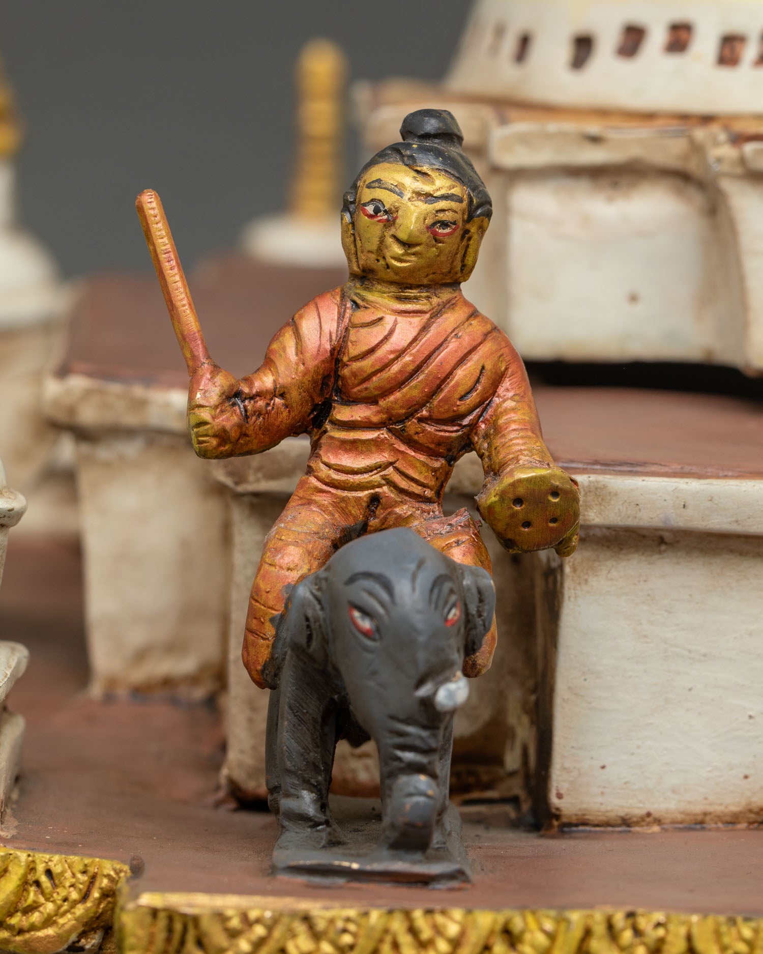 Close-up of elephant guardian figure on Boudha Stupa base sculpture