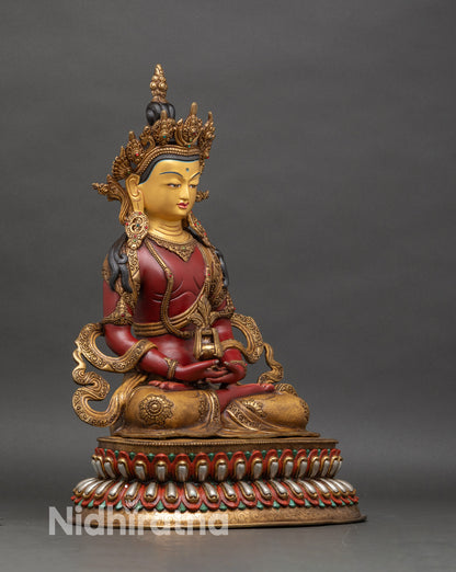 Close-up of Amitayus Buddha face painted with vibrant acrylic colors, serene expression