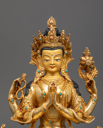 Close-up Chenrezig Avalokiteshvara statue showing wish-fulfilling gem and utpala flower