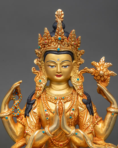 Close-up Chenrezig face gold painted with semi-precious stones, Newari craftsmanship