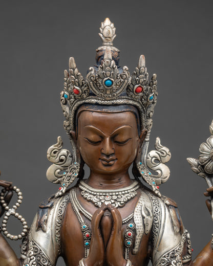 Close-up Chenrezig face – serene expression, jeweled crown, and semi-precious stones