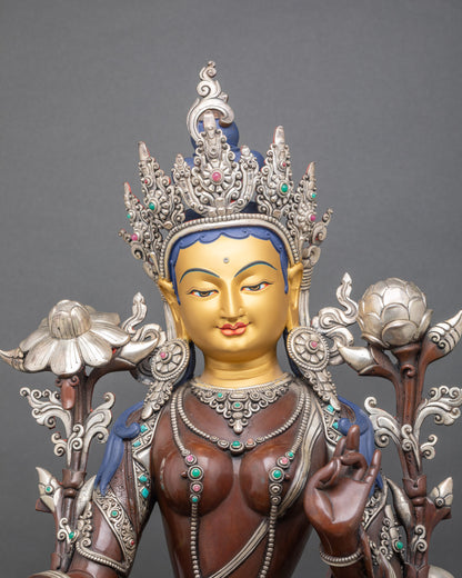 Close-up Green Tara face with five-jewel crown and serene hand-painted details