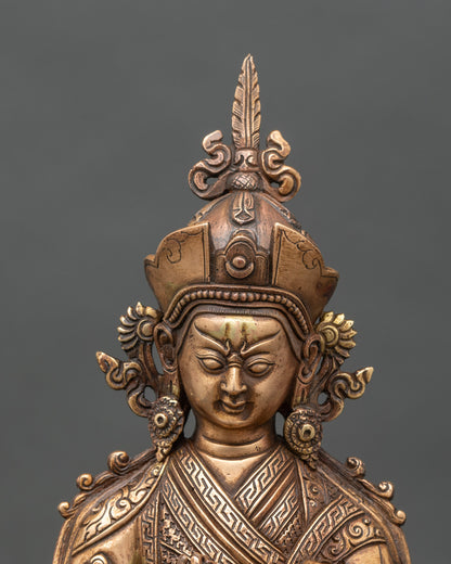Regular close-up of Guru Tsokye Dorje statue showing detailed lotus pedestal and Vajra