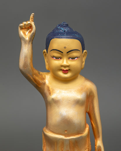 Close-up Littel Buddha statue, gold-painted face, handmade in Nepal