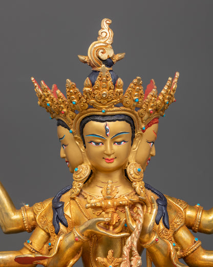 Close-up Namgyalma face gold-painted semi-precious stones spiritual protection