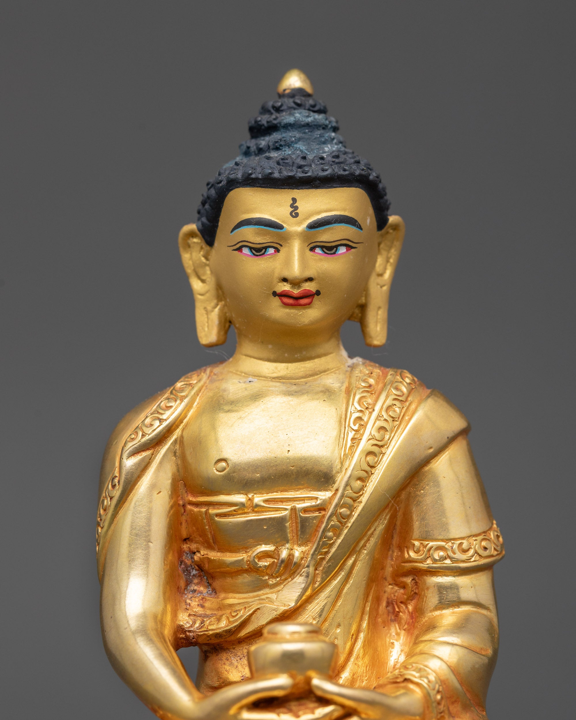 face with peaceful gold-painted expression