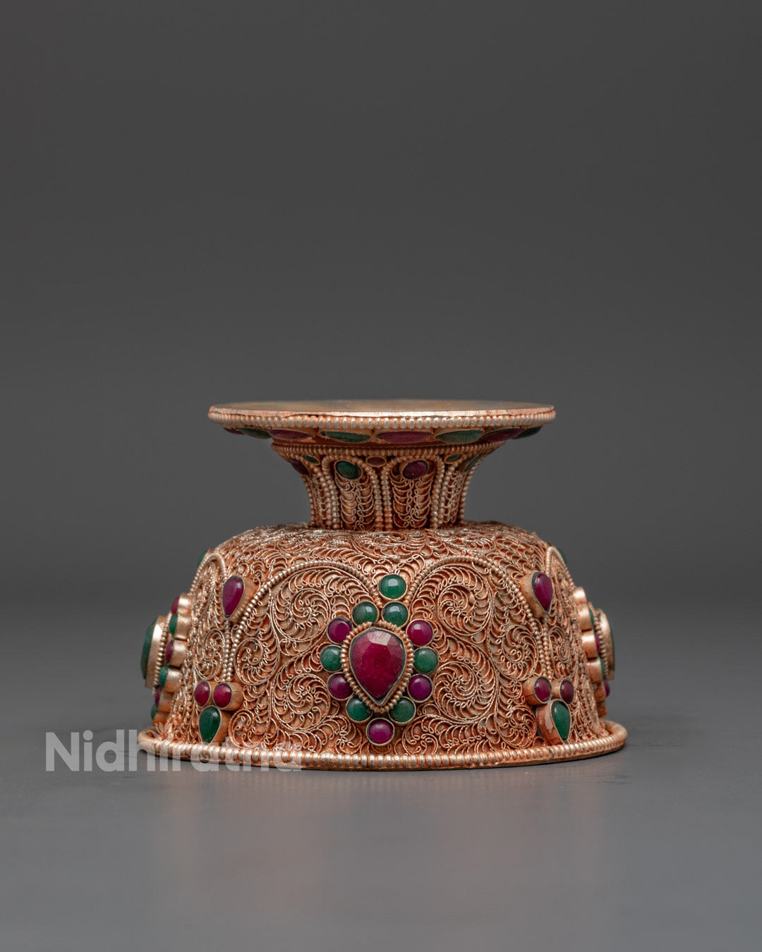 Close-up angle of Buddhist Watering Offering Bowl adorned with semi-precious stones for rituals