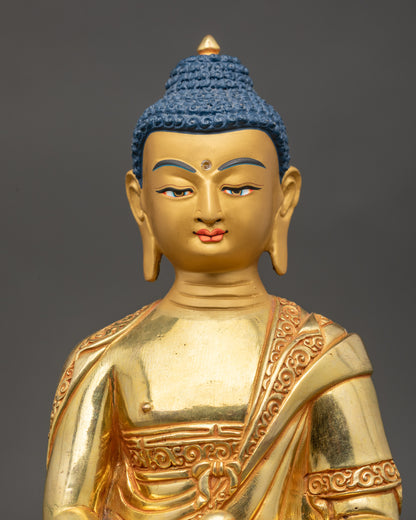 Close-up of Amida Nyorai Buddha face showing intricate 3D copper carvings