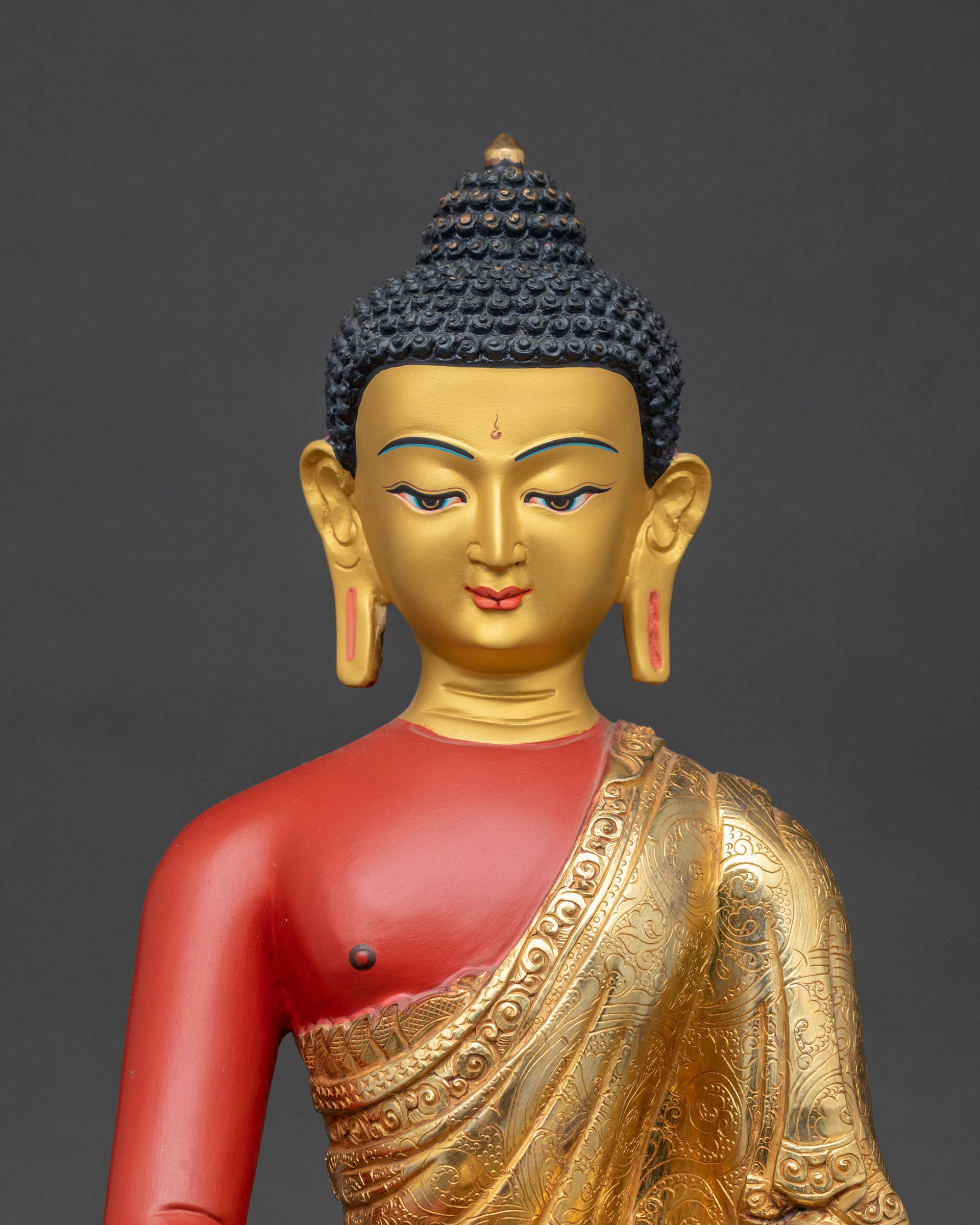 Close-up of Amitabha Buddha face, 24k gold-painted, showing serene meditation expression