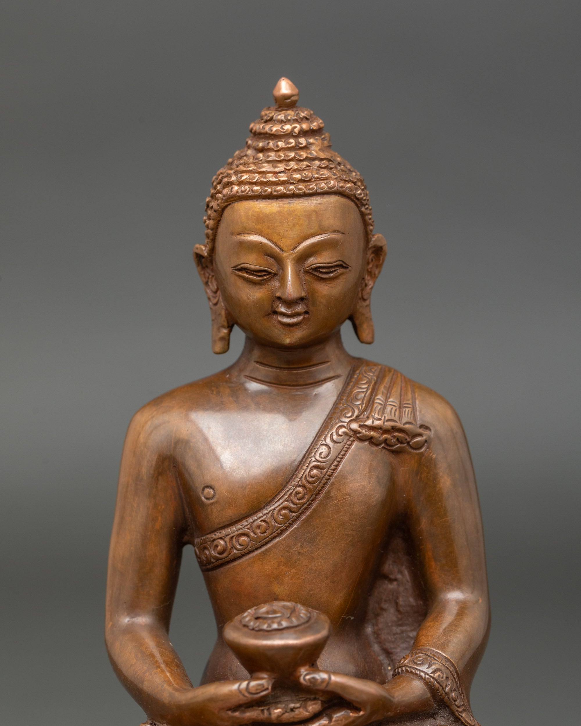 Close-up of Amitabha Buddha face, serene expression, gold and copper meditation details