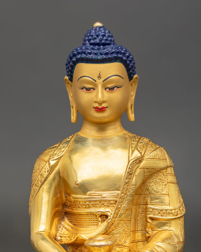 Close-up of Amitabha Buddha face showing a serene expression and intricate golden details