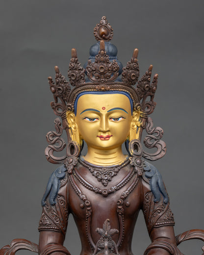 Close-up of Amitayus Buddha face, gold-painted and detailed Nepalese craftsmanship