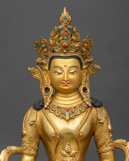 Close-up of Amitayus Buddha face, gold-painted, fire-gilded Nepalese sculpture