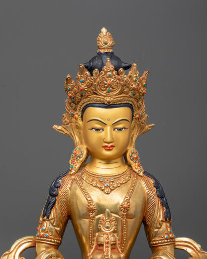 Close-up of Amitayus Statue face and kalash with 24k gold detailing