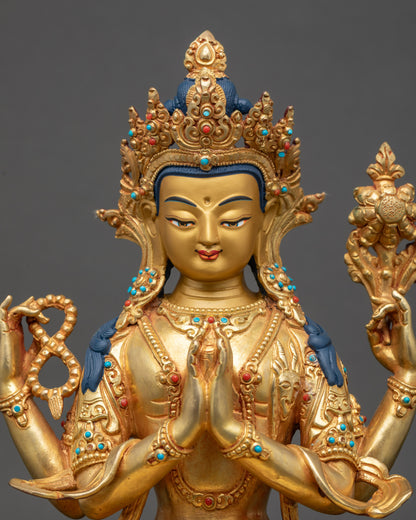 Close-up of Avalokiteshvara gold-painted face with serene compassionate expression