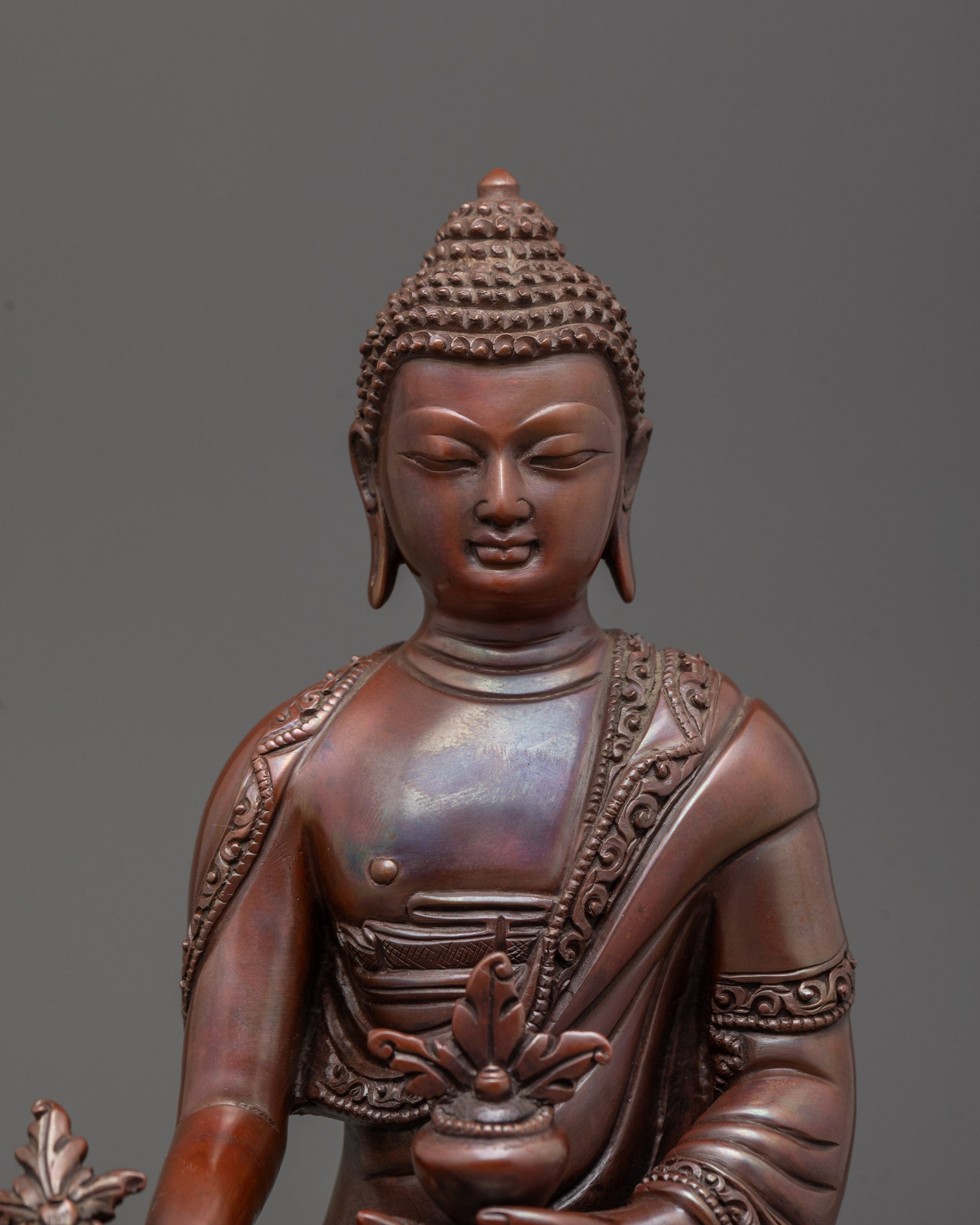 Close-up of Bhaisajyaguru Oxidized Face and Myrobalan Bowl Details

