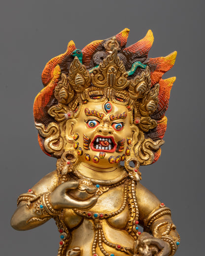 Close-up of Black Dzambhala’s wrathful face and golden crown symbolizing protection wealth