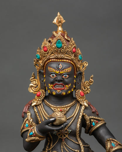 Close-up of Black Dzambhala statue showing intricate copper and acrylic details