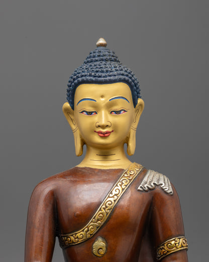 Close-up of Buddha’s oxidized copper body, detailed robes, patra bowl, and gold & silver plating