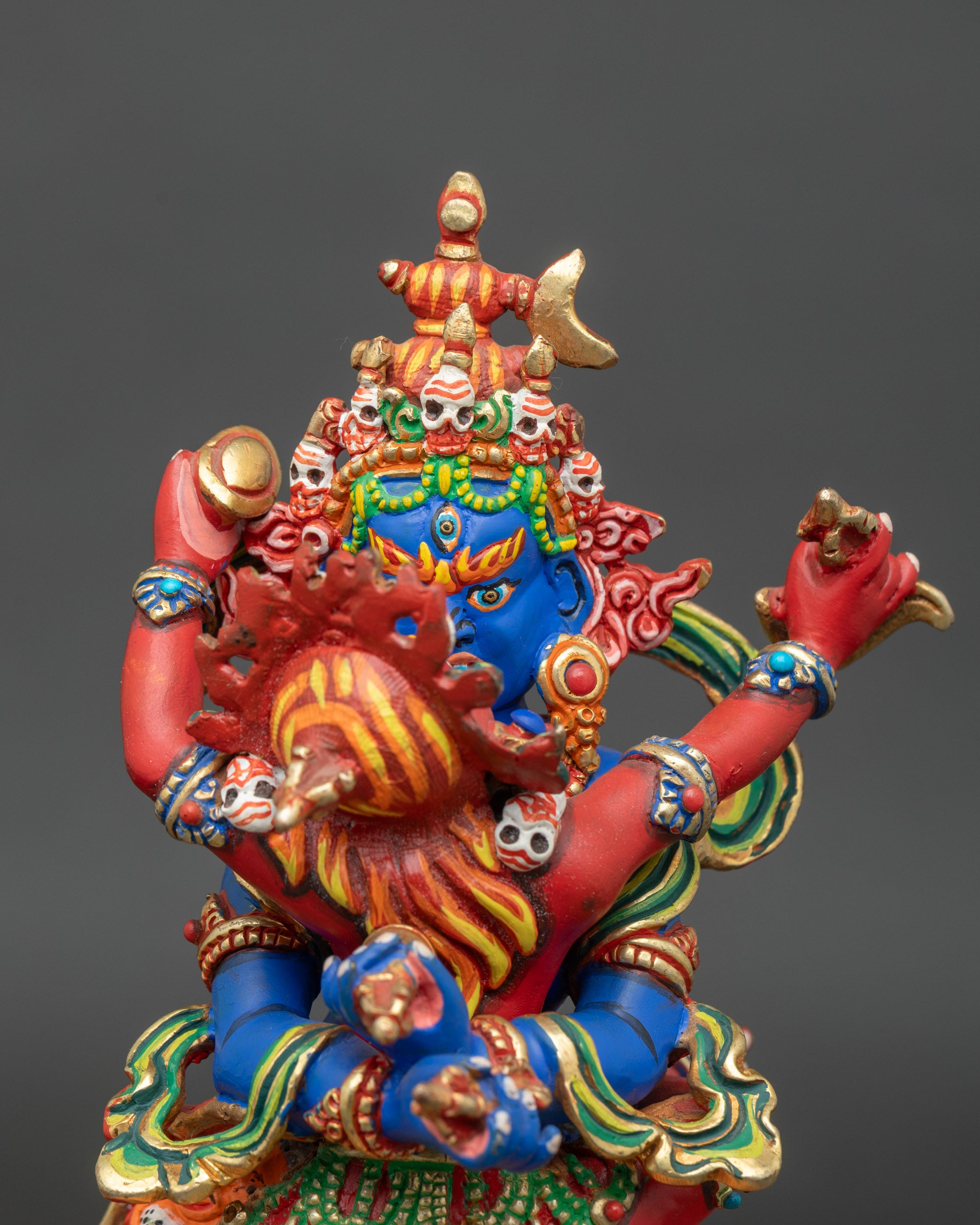 Close-up of Chakrasamvara deity showing intricate copper and acrylic color details