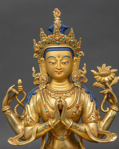 Close-up of Chenrezig Bodhisattva face, gold-painted features and intricate craftsmanship