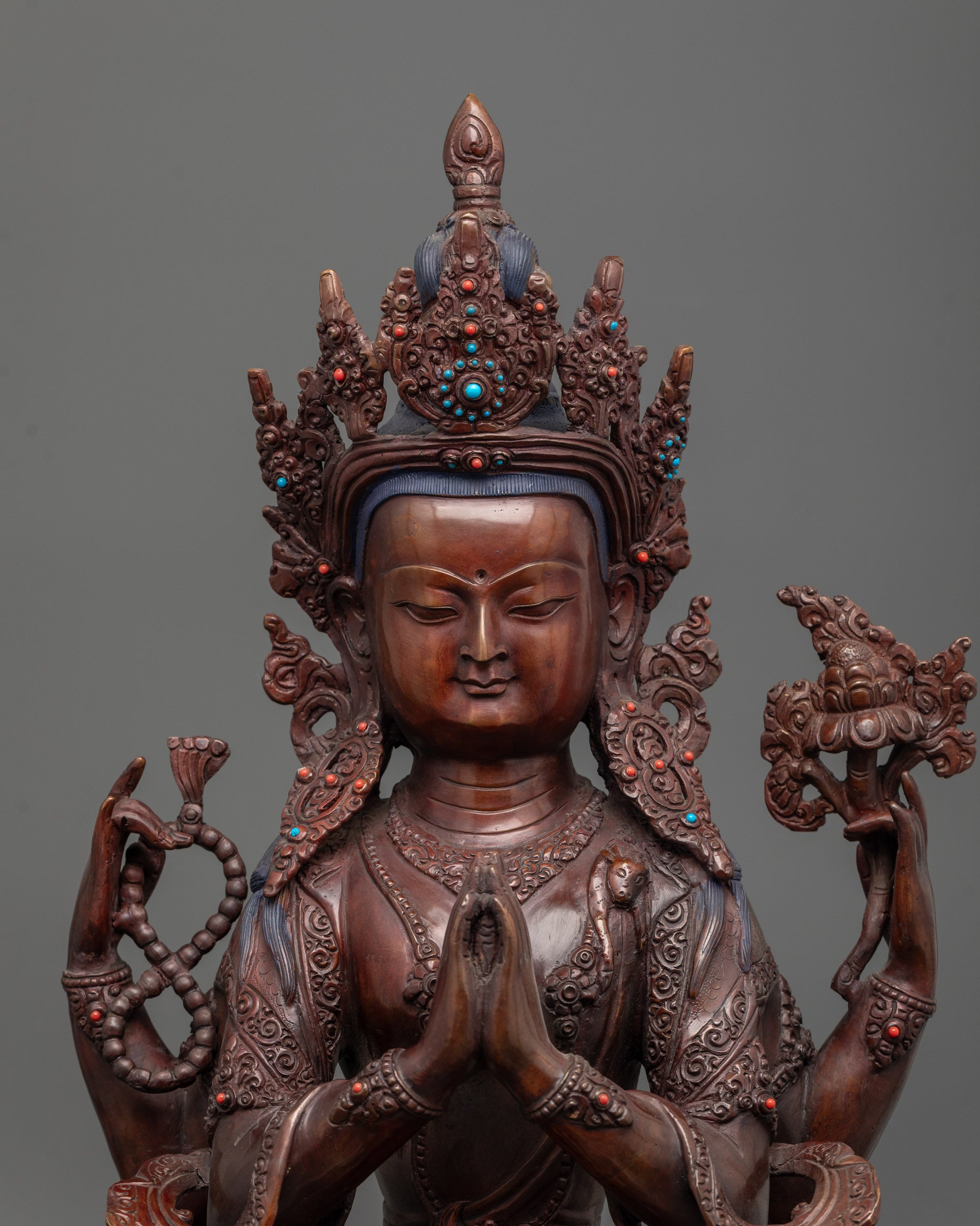 Close-up of Chenrezig Statue showing semi-precious stones and intricate hand-carved patterns