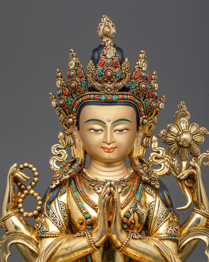 Close-up of Chenrezig’s gold-gilded face, 5-jeweled crown, and detailed jewelry