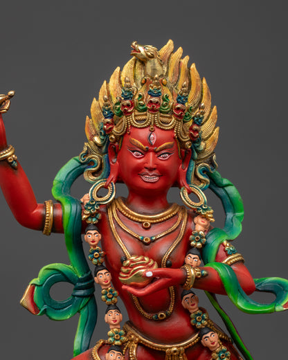 Close-up of Dorje Phagmo’s radiant red form with five-skull crown and fire-gilded gold halo