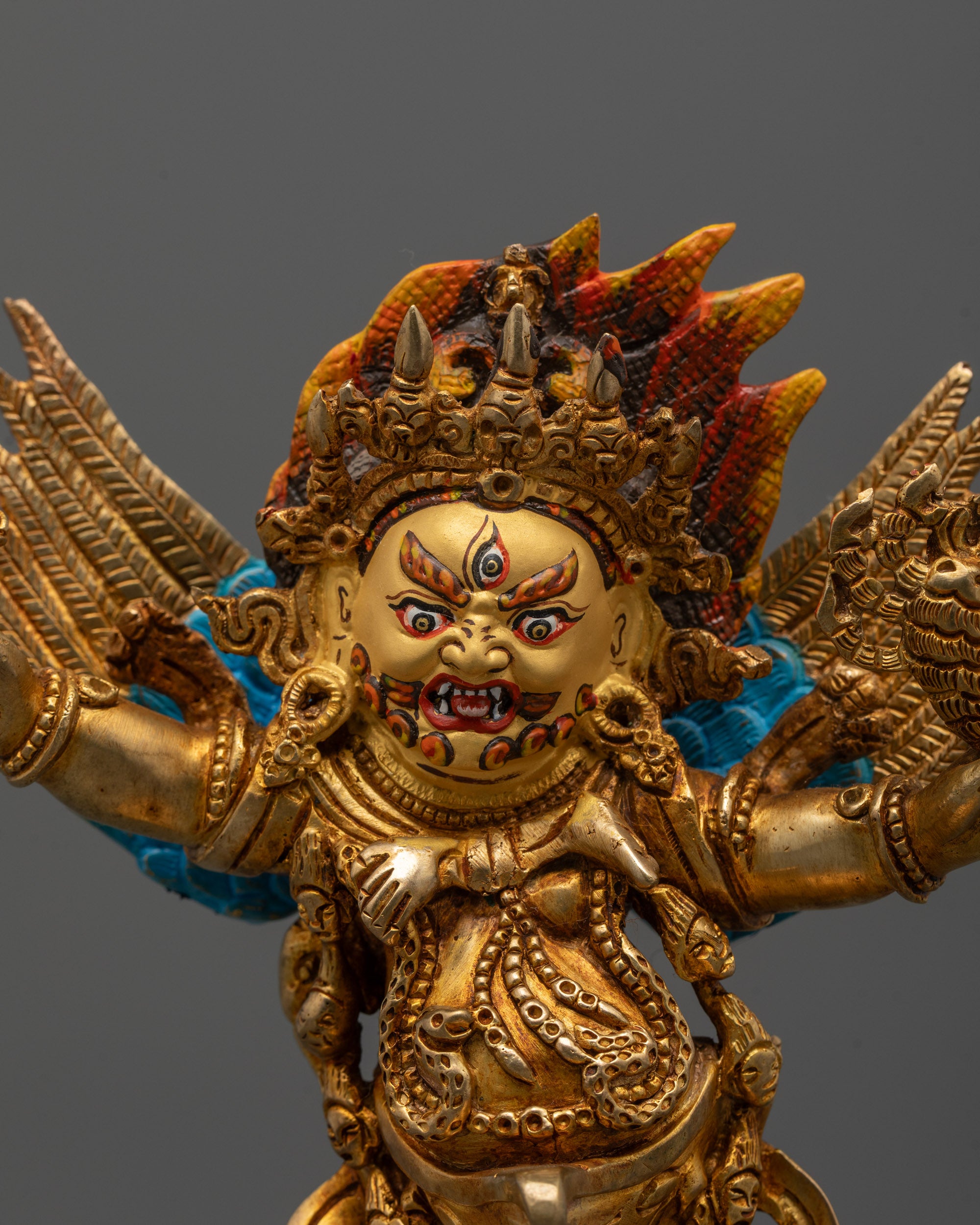 Close-up of Dorje Phurba’s face and phurba dagger, showcasing intricate artisan detailing