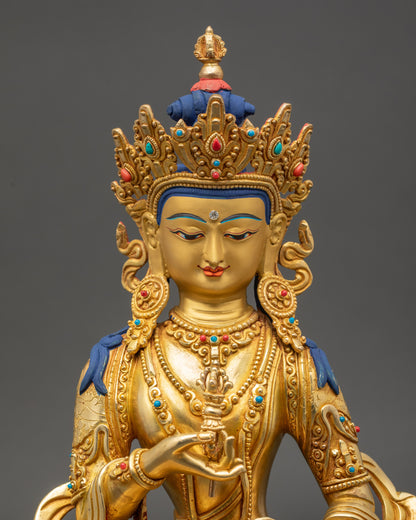 Close-up of Dorje Sempa holding vajra and bell, handcrafted Nepalese sculpture