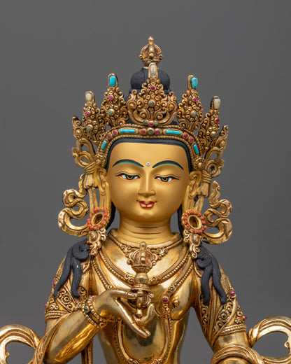 Close-up of Dorje Sempa’s vajra and bell, gold-gilded face, and semi-precious stones detail