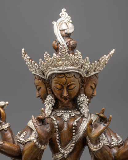 Close-up of Dukkar statue's face and jewelry showcasing lost wax carving and silver finish