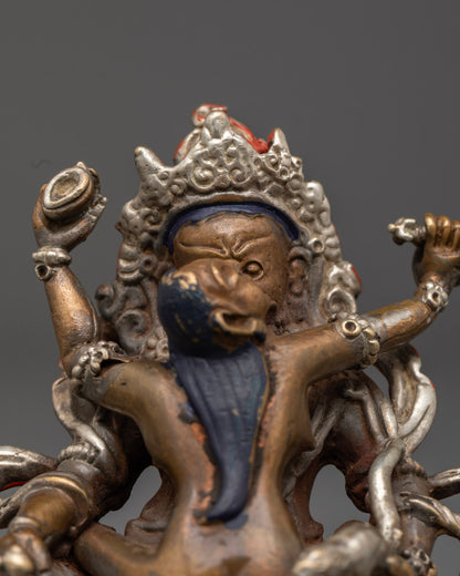 Dzambhala Yab-Yum statue showing detailed facial expressions, jewel-spouting mongoose, and intricate acrylic color accents.