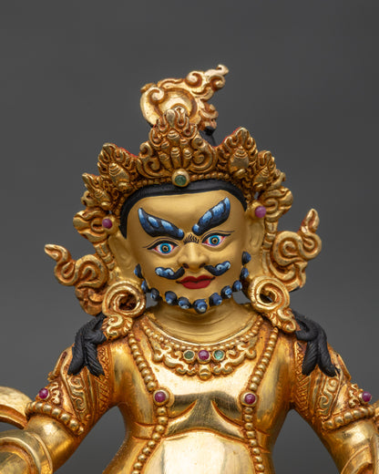 Close-up of Dzambhala face showing five-jeweled crown and wrathful expression